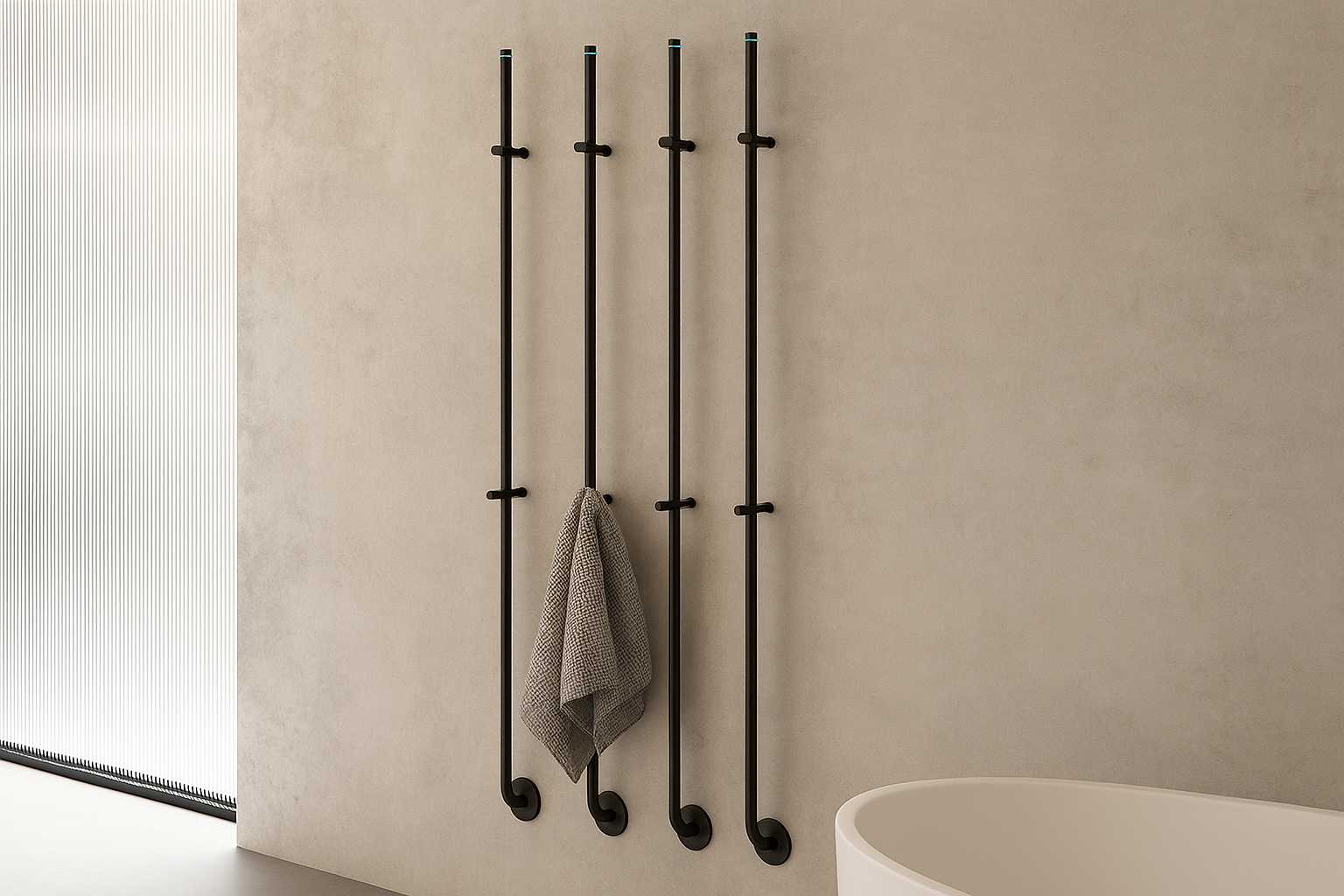Ganchos de parede modernos em ferro preto, ideais para pendurar toalhas ou roupas, instalados em uma parede de cor neutra no banheiro.